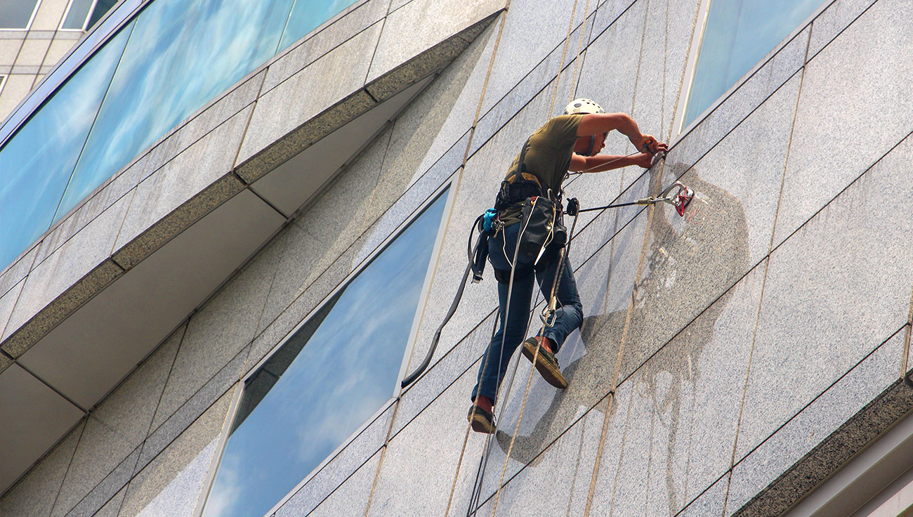 Man Cleaning Window Man Cleaning Window